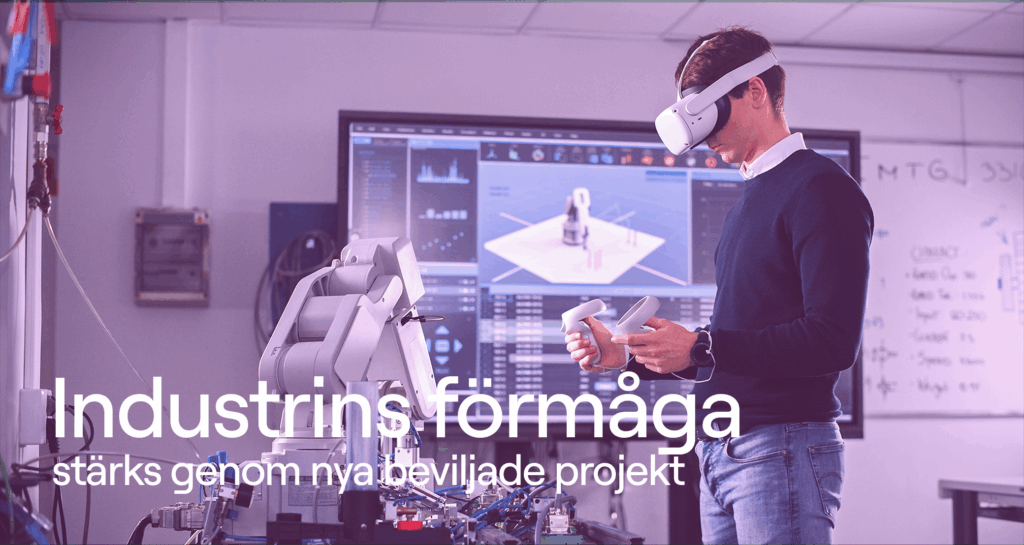 Ingenjör i labb med robot och vr glasögon